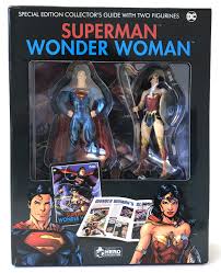 Superman & Wonder Woman Figurines with Special Edition Guide