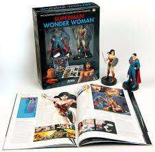 Superman & Wonder Woman Figurines with Special Edition Guide